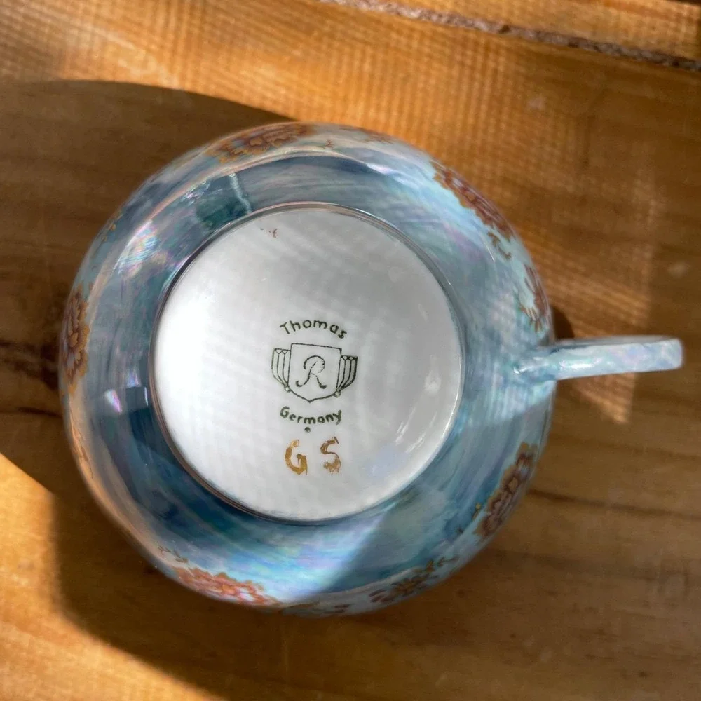 Vintage Blue Iridescent Teacup and Saucer Thomas Germany Lustreware Floral‎